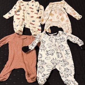4 unisex zippered onesies